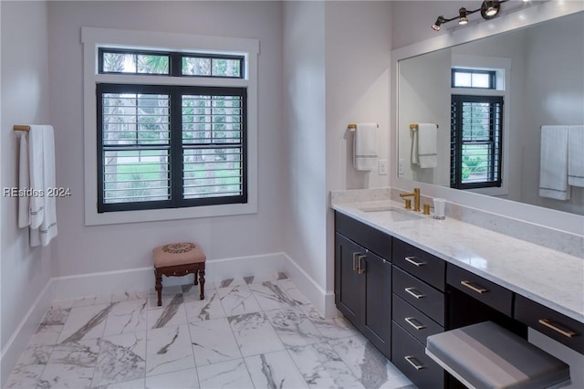 bathroom featuring vanity and plenty of natural light