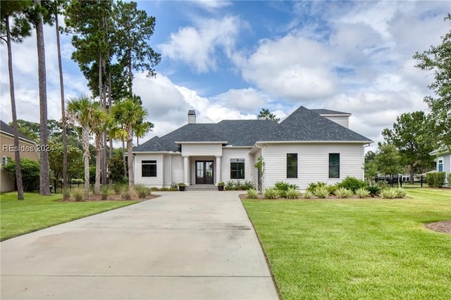 view of front of home with a front yard