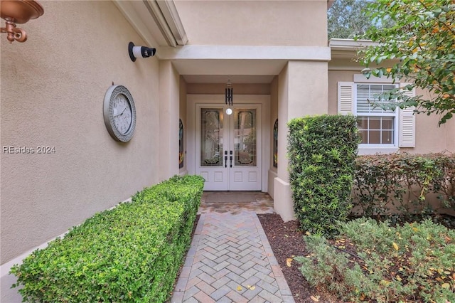 entrance to property featuring french doors