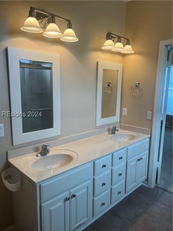 bathroom with vanity and tile patterned floors