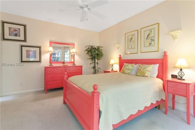 bedroom with ceiling fan and carpet