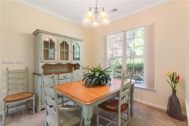 dining area with crown molding, carpet, a wealth of natural light, and a notable chandelier