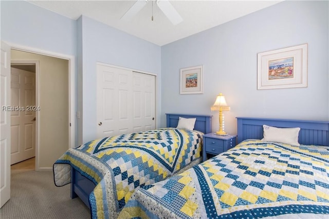 bedroom with ceiling fan, carpet floors, and a closet