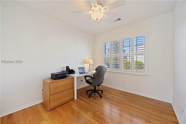 office area featuring ceiling fan and light wood-type flooring