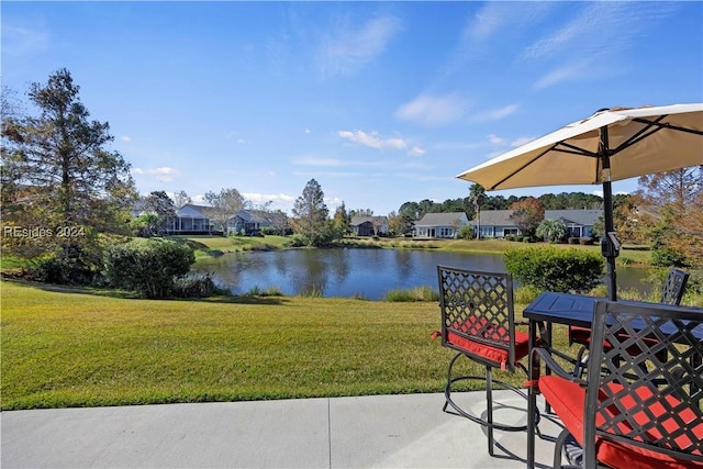 view of patio featuring a water view