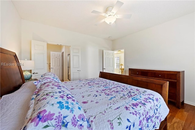 bedroom featuring dark wood-type flooring and ceiling fan