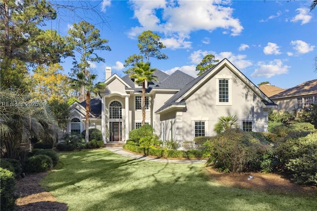 view of front of home featuring a front lawn