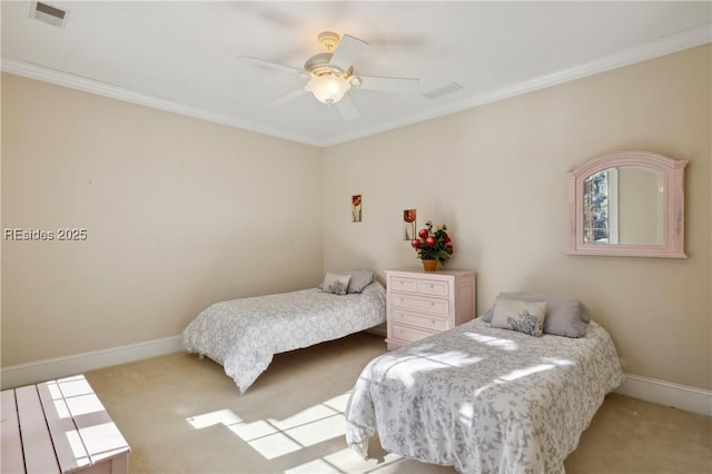 bedroom featuring crown molding, ceiling fan, and carpet