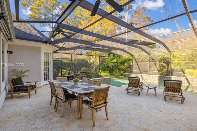 view of patio / terrace with a lanai