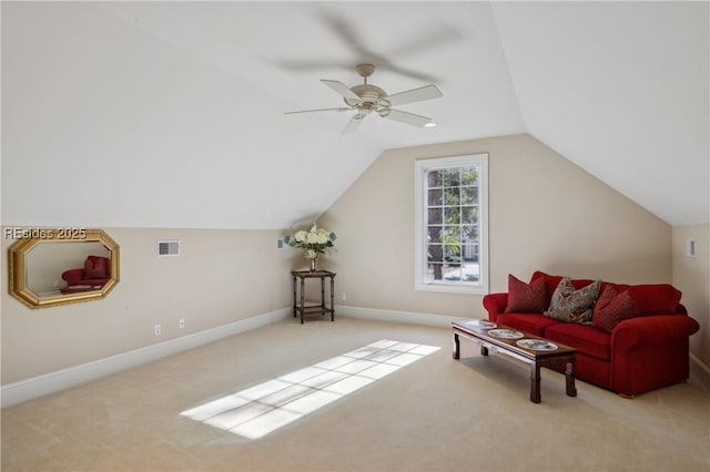 additional living space with ceiling fan, lofted ceiling, and light carpet