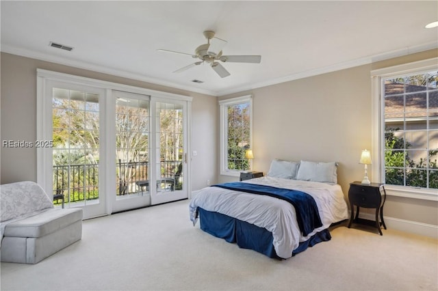 carpeted bedroom featuring crown molding, ceiling fan, and access to exterior