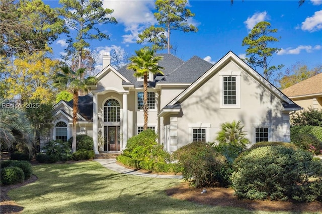 view of front of home with a front yard