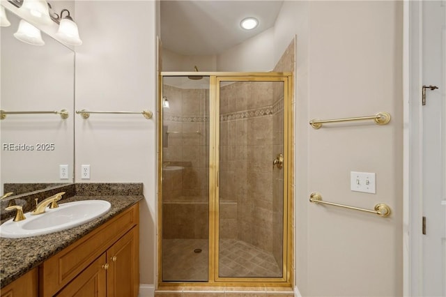 bathroom with vanity and walk in shower