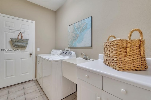 laundry room featuring light tile patterned flooring and independent washer and dryer