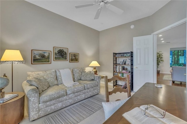 living room featuring ceiling fan