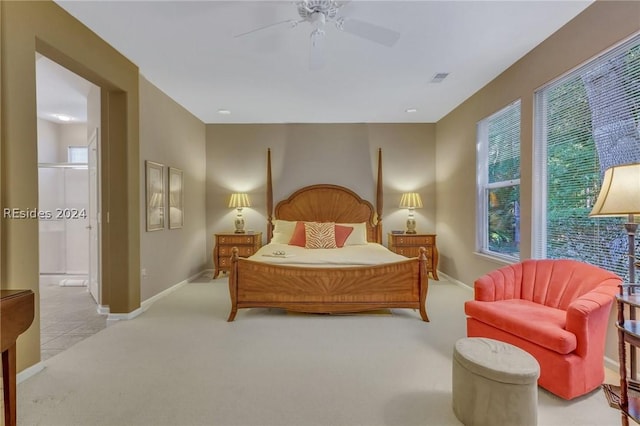 bedroom with light carpet and ceiling fan