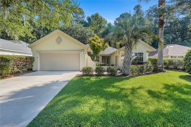 ranch-style home featuring a garage and a front lawn