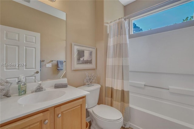 full bathroom featuring vanity, toilet, and shower / bath combo with shower curtain