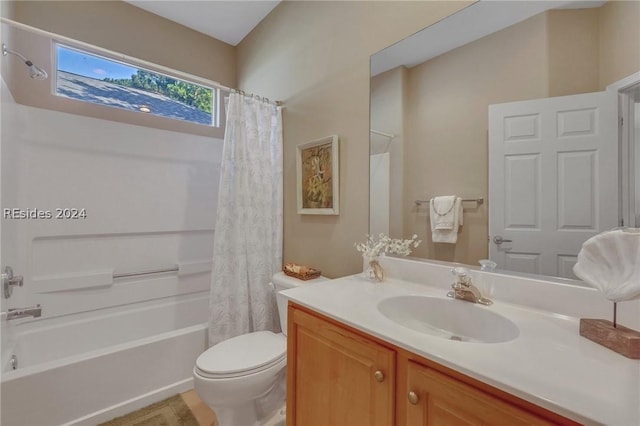 full bathroom featuring shower / tub combo with curtain, vanity, and toilet