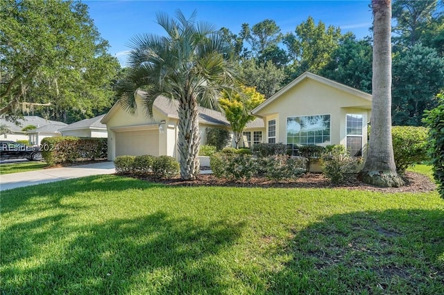 ranch-style home with a garage and a front yard