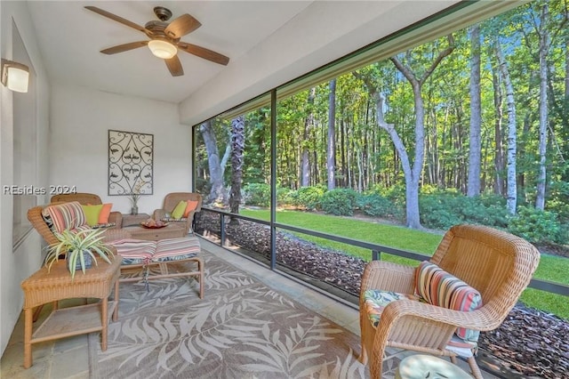 sunroom / solarium with ceiling fan