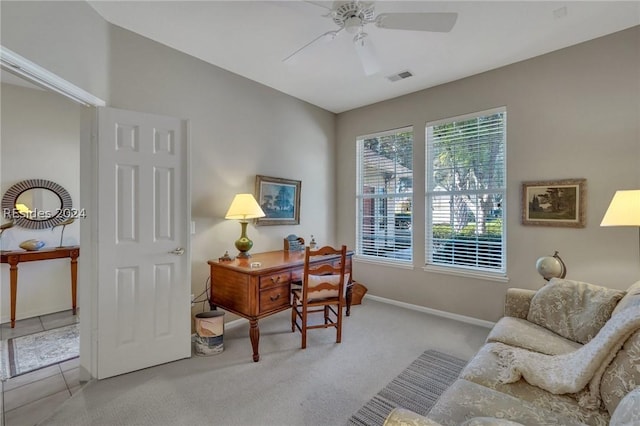 office featuring light colored carpet and ceiling fan