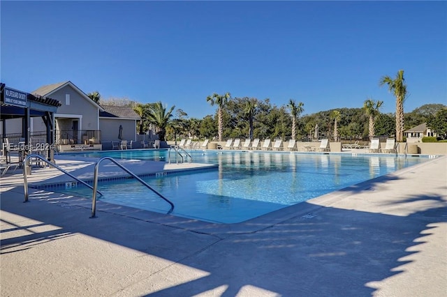 view of swimming pool featuring a patio