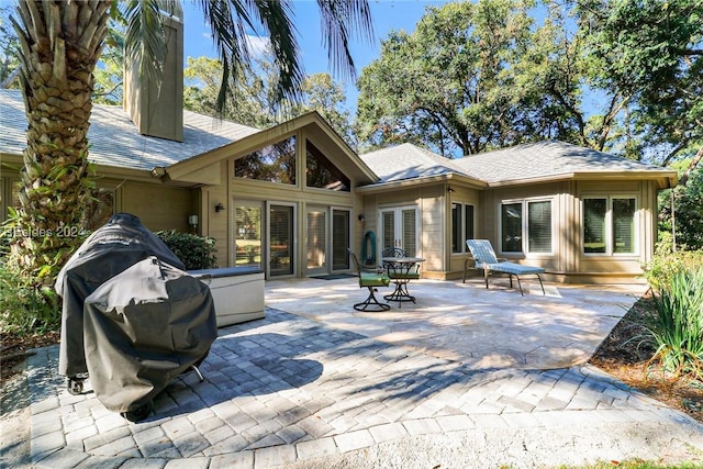 rear view of property with a patio