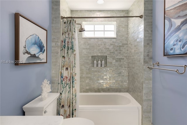 bathroom featuring shower / tub combo with curtain and toilet