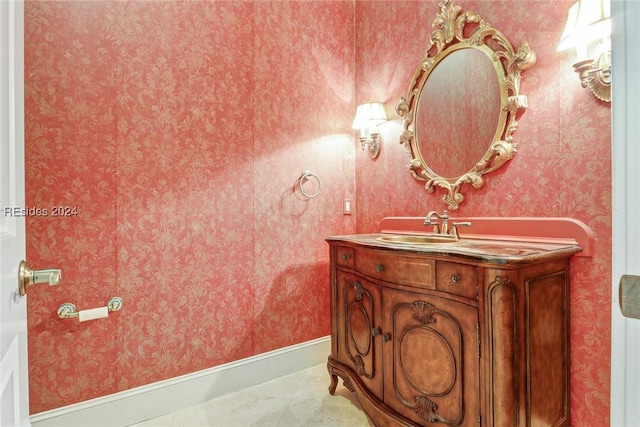 bathroom with vanity and tile patterned flooring