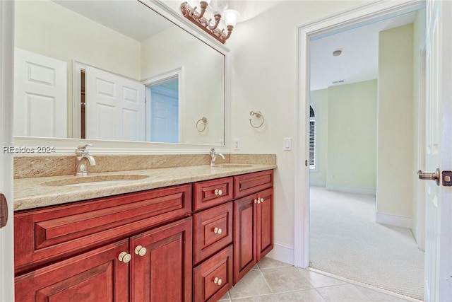 bathroom with vanity and tile patterned flooring