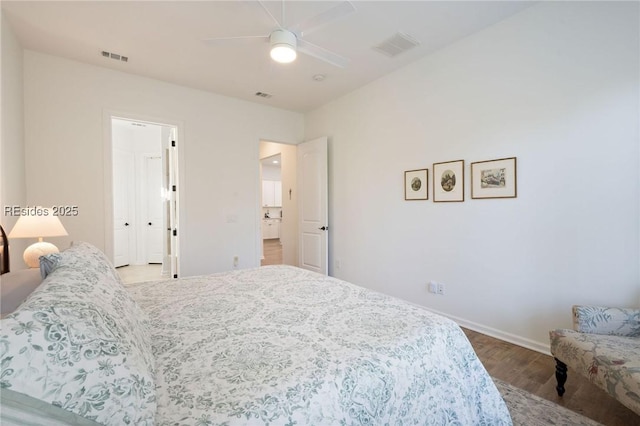 bedroom with hardwood / wood-style flooring and ceiling fan