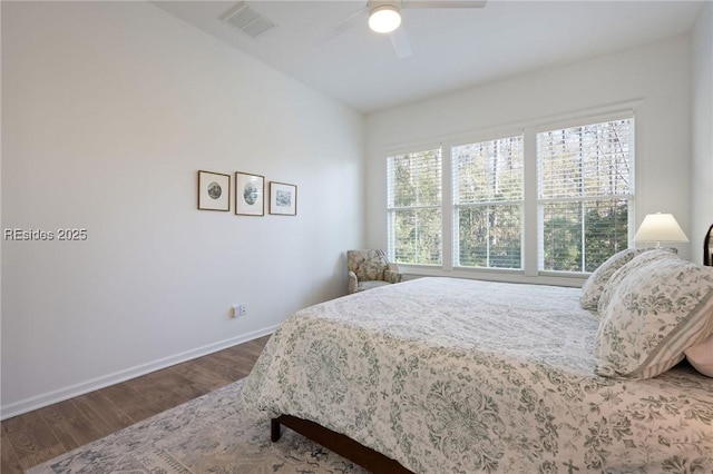 bedroom with ceiling fan and hardwood / wood-style floors