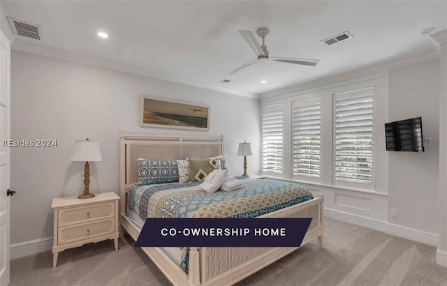 carpeted bedroom with crown molding and ceiling fan