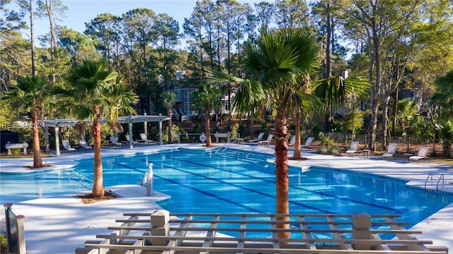 view of swimming pool featuring a patio area