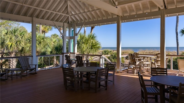 wooden terrace with a gazebo and a water view