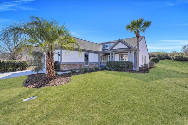 view of front of home with a front lawn