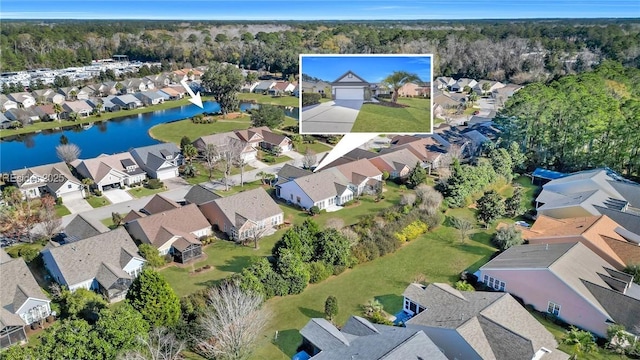 bird's eye view with a water view