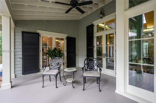 view of patio with french doors and ceiling fan