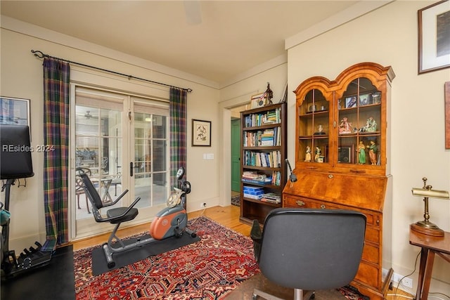 office space with wood-type flooring