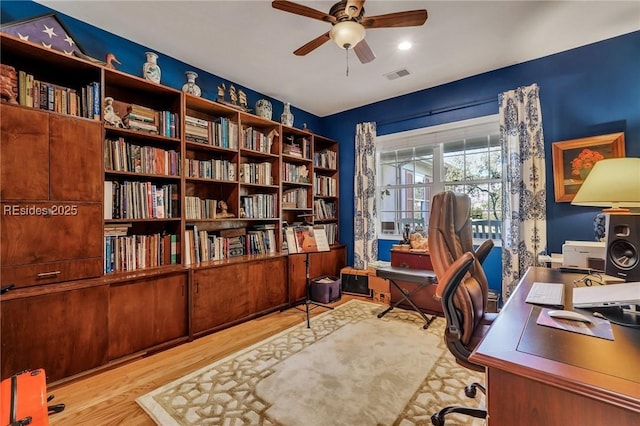 office area featuring ceiling fan and light wood-type flooring