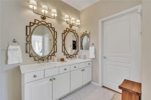 bathroom featuring vanity and tile patterned flooring