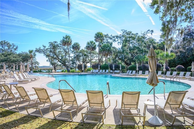 view of swimming pool featuring a patio area