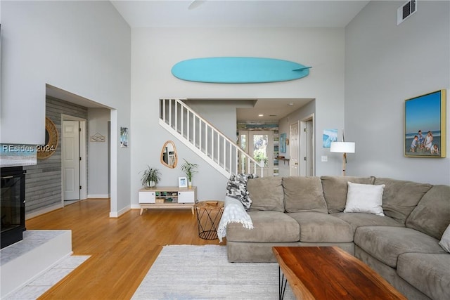 living room with light hardwood / wood-style flooring