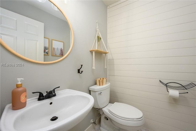 bathroom with sink and toilet