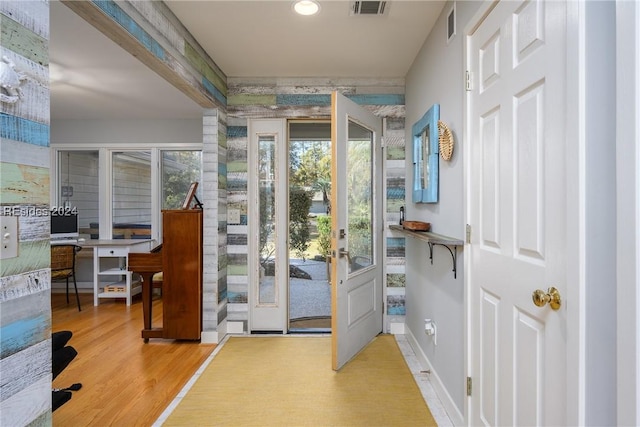 entryway featuring hardwood / wood-style flooring