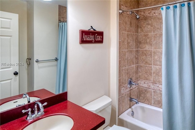 full bathroom featuring shower / bathtub combination with curtain, vanity, and toilet