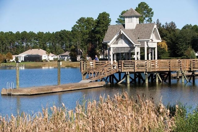 dock area featuring a water view