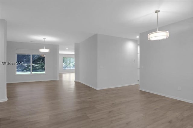 unfurnished room featuring light hardwood / wood-style floors