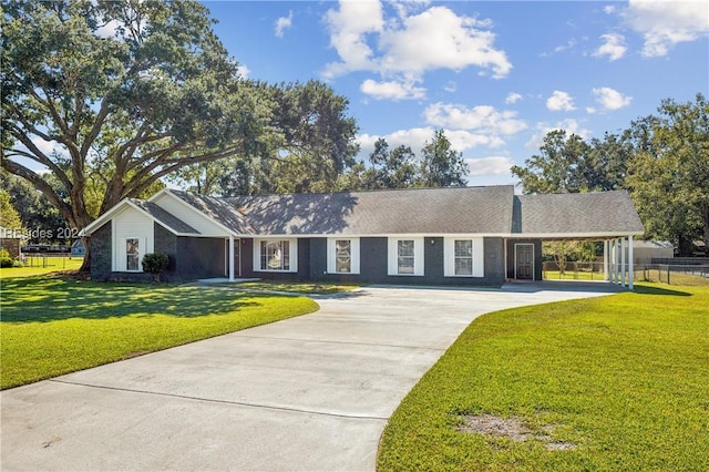 single story home with a carport and a front lawn